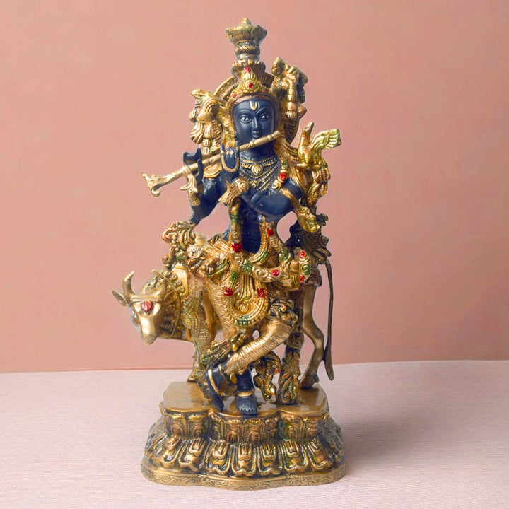 Large Brass Idol of 17 Inch Brass Krishna Statue with Cow. Enhance your space with the divine presence of this 17-inch Brass Krishna Statue with Cow. This beautifully crafted sculpture features Lord Krishna in a serene pose, accompanied by a cow, symbolizing the deep connection between the divine and nature.