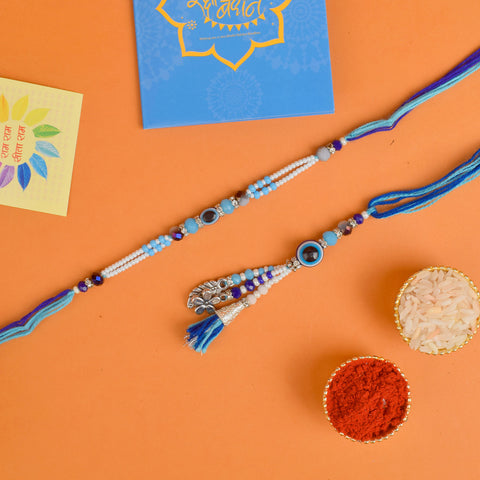 Designer Couple Rakhi Set for Bhaiya and Bhabhi with Roli Chawal and Ram Sita Stickers β Raksha Bandhan Gift Combo. Indiaβs Largest Brass Idols Brand - www.satvikstore.in