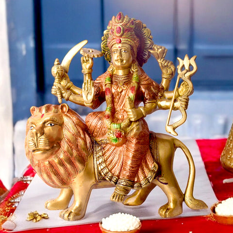 11 Inch Brass Idol of Sherawali Mata Statue for Home Temple Elevate your home temple with this Brass Sherawali Mata Idol, a beautifully crafted depiction of Durga Maa on her lion. Made from premium brass with intricate detailing, this durable statue is perfect for Pooja, festive dΓ©cor, or gifting. India's Largest Puja Accessories Brand - Satvik