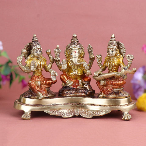4.7 Inch Brass Lakshmi Ganesh with Saraswati Idol featuring finely detailed craftsmanship, ideal for pooja room and festive dΓ©cor. No.1 Brass Idol Store www.satvikstore.in