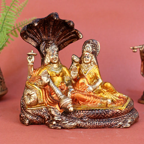 6.4 Inch Brass Colorful Vishnu Laxmi Idol β Exquisitely handcrafted and vibrantly painted statue of Lord Vishnu and Goddess Lakshmi, symbolizing wealth, protection, and divine harmony, ideal for home temples and festive decor. No.1 Brass Idol Store www.satvikstore.in