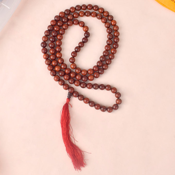 Certified 12mm 100% original authentic red sandalwood (Chandan) jap mala from Andhra Pradesh, featuring large polished beads for meditation, chanting, and spiritual rituals.India’s Premium Jap Mala Store - www.satvikstore.in