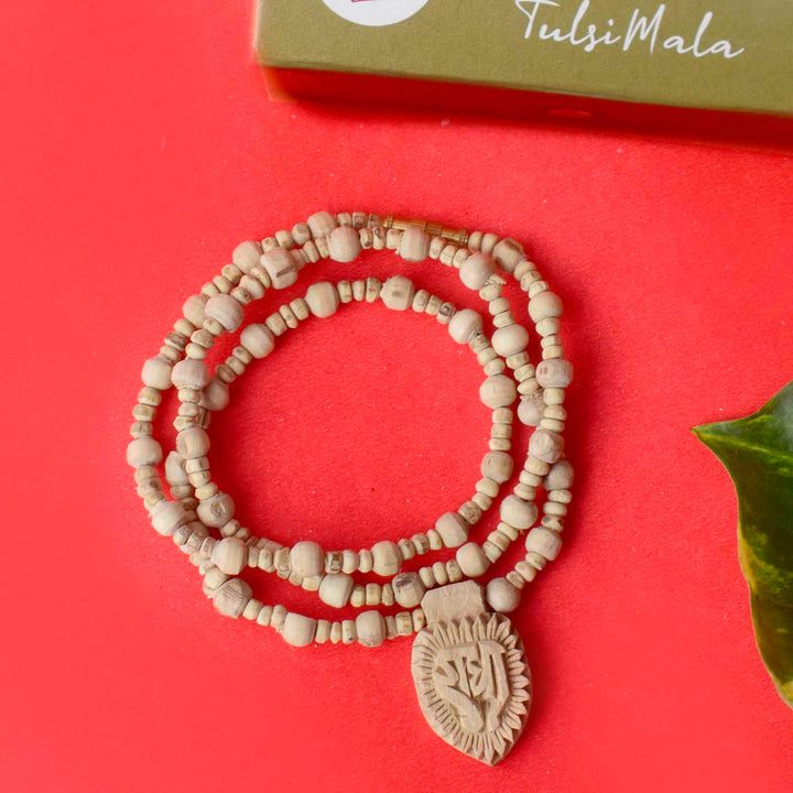 100% Original Sacred Tulsi Mala with natural Tulsi beads and a Radha locket, ideal for spiritual practices, devotion, and daily wear. India’s Premium Jap Mala Store- www.satvikstore.in