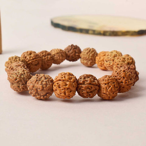 Certified brown rudraksha bracelet with silver capping, worn for spiritual protection and healing. Indiaβs Premium Rudraksha Jap Mala Store- www.satvikstore.in