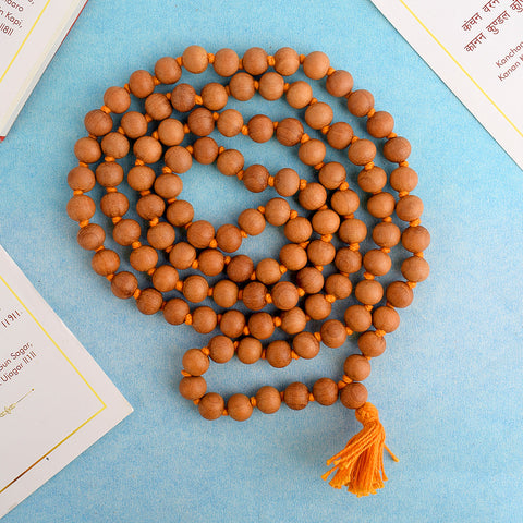 Regular Chandan Jaap Mala made from natural sandalwood beads, strung together for meditation and prayer. Indiaβs Premium Jap Mala Store- www.satvikstore.in