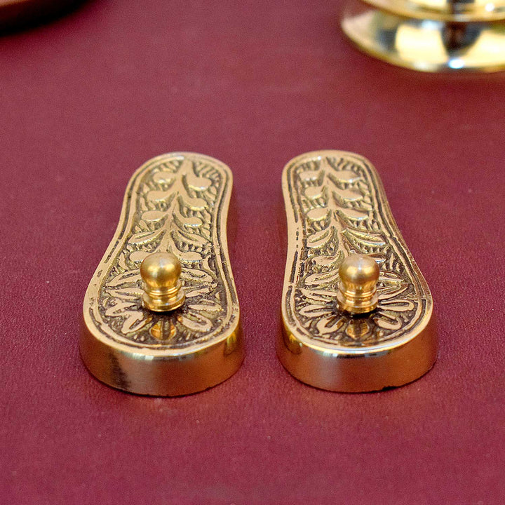 "Divine Brass Charan Paduka (Khadau) for Temple and Home Mandir Worship placed for spiritual offerings". 
Indiaβs Largest Pooja Accessories Brand - www.satvikstore.in