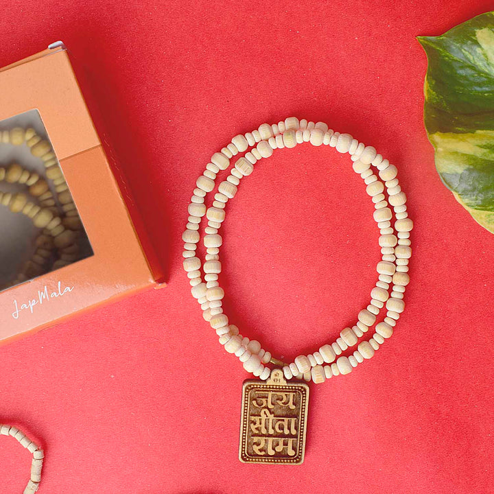 Wooden Jaap Mala with a Sita Ram locket, featuring natural wooden beads strung for mantra chanting, meditation, and spiritual practices. India’s Premium Jap Mala Store- www.satvikstore.in