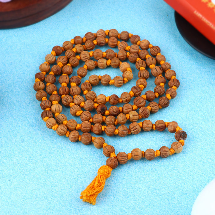 Regular Cut Design Sandalwood (Chandan) Jap Mala featuring uniquely carved fragrant beads, perfect for spiritual chanting, meditation, and daily prayer. India’s Premium Jap Mala Store- www.satvikstore.in