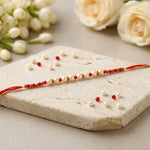 Lustrous Pearl and Crystal Beaded Designer Rakhi
