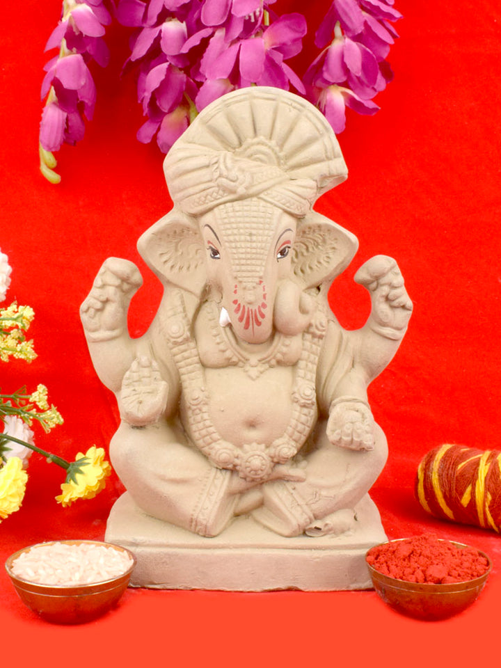 8 Inch eco-friendly Ganesh idol wearing a traditional pagdi, crafted from natural shadu mati clay for sustainable Ganesh Chaturthi celebrations. India’s Largest Pooja Accessories Brand – www.satvikstore.in 