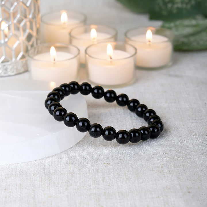 Natural black onyx healing bracelet with 8mm round beads. India’s Largest Pooja Accessories Brand - www.satvikstore.in
