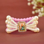 Blush Orchid with White Pearl Four Layer Guruji Swaroop Bracelet featuring delicate blush orchid beads and luminous white pearls with Jai Guruji Swaroop – perfect for spiritual wear, festive gifting, and daily devotion. India’s Largest Pooja Accessories Brand – www.satvikstore.in