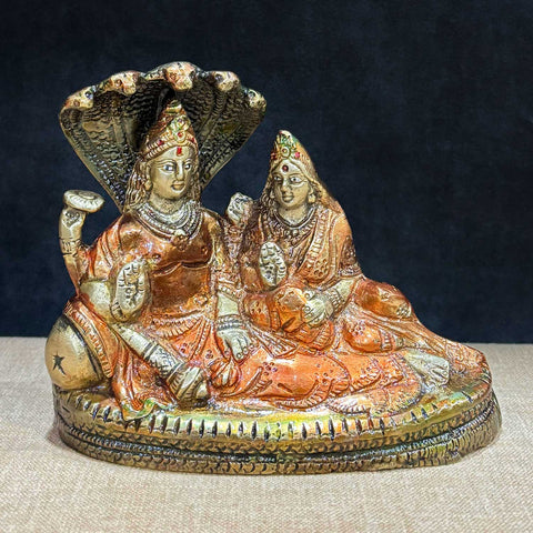 4.7 Inch Vishnu Ji Resting on Snake – Handcrafted Brass Statue Depicting Lord Vishnu on Sheshnag, Symbol of Protection, Balance, and Divine Energy for Home Temple Decor. No.1 Brass Idol Store www.satvikstore.in 