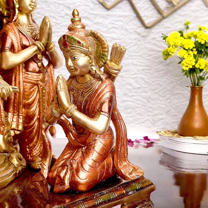 Large Brass Idol of 23 Inch Elegant Brass Ram Darbar Idol. This Elegant Brass Ram Darbar Idol&nbsp;beautifully captures the essence of divinity and royalty. Crafted with intricate detailing, it showcases Lord Ram in a regal pose, symbolizing strength, devotion, and grace.  