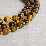 Tiger Eye Hakik Mala (108 Beads) – A Stone of Strength & Protection