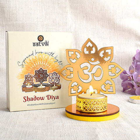 Designer OM Shadow Diya crafted in elegant metal, designed to cast a sacred "ॐ" shadow when lit, perfect for spiritual ambiance, meditation corners, and festive home décor. India’s Largest Pooja Accessories Brand – www.satvikstore.in
