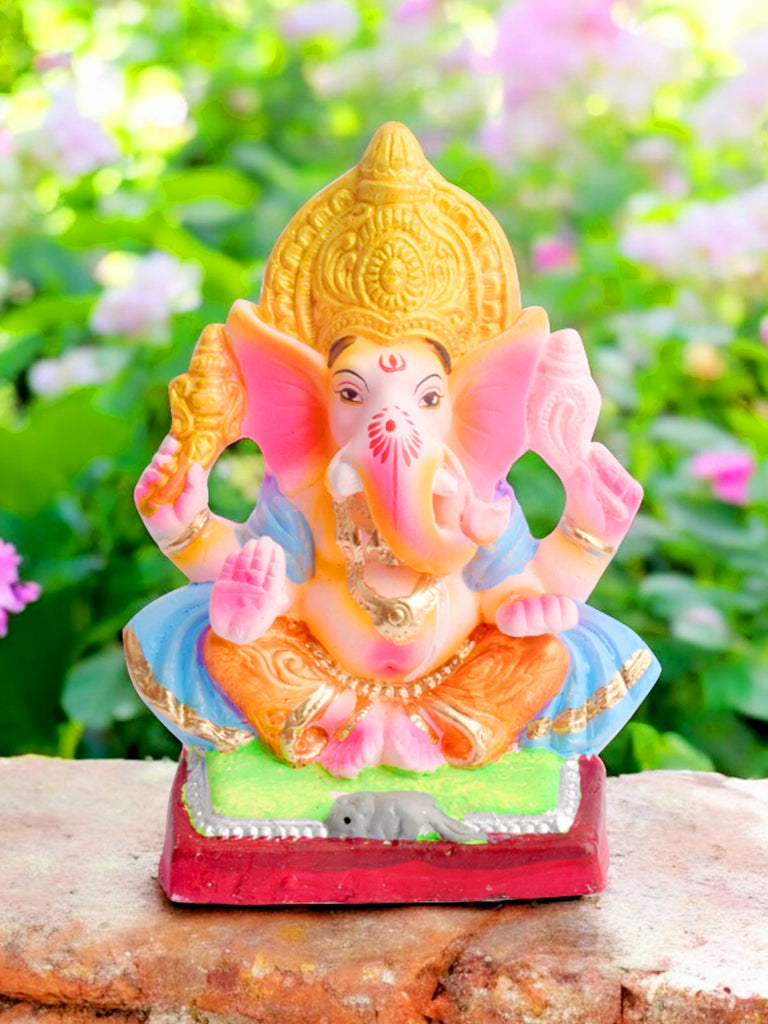 Eco-friendly 8-inch Ganesha idol in Gajanan pose wearing a sky blue patka, handcrafted using natural clay for an eco-conscious celebration. India’s Largest Pooja Accessories Brand – www.satvikstore.in