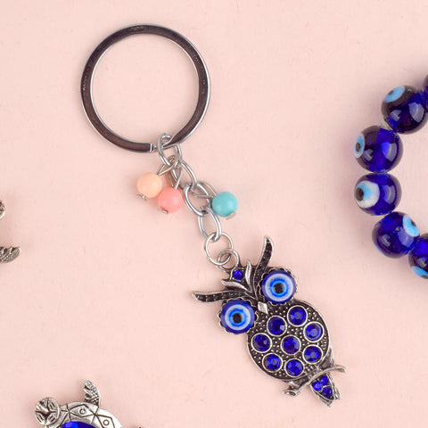 Evil Eye Owl Keychain – A Feng Shui good luck charm designed to bring protection, wisdom, and fortune into your life. India’s Largest Pooja Accessories Brand – www.satvikstore.in