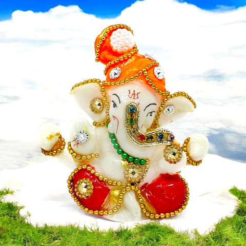 A beautifully crafted Ganesh idol, made from premium material, depicting Lord Ganesha in a serene and graceful pose. India’s Largest Pooja Accessories Brand – www.satvikstore.in 