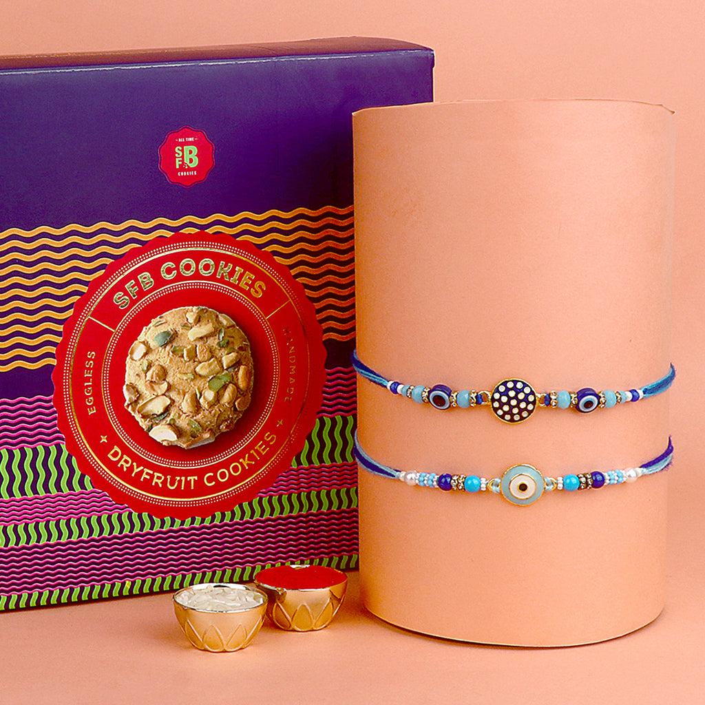 Image of a beautifully designed Rakhi with sweets, the perfect combination of tradition and sweetness for Raksha Bandhan celebration. Shop now at SatvikStore.in. #Rakhi #RakhiOnline #SendRakhi #DesignerRakhi #BeautifulRakhi #LatestRakhi #NewRakhi #ModernRakhi