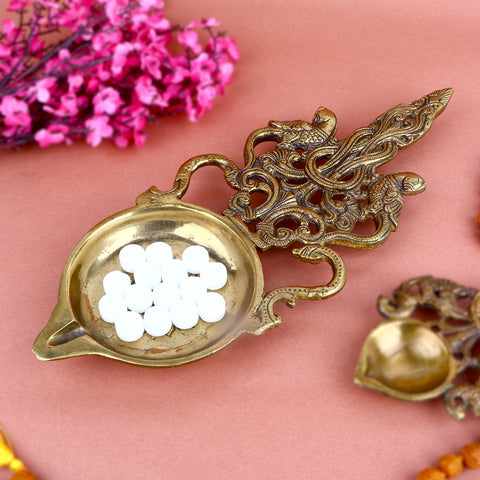 Designer Brass Pooja Aarti Spoon Large, a finely crafted large brass spoon used for performing aarti during pooja ceremonies and spiritual rituals. 
India’s Largest Pooja Accessories Brand – www.satvikstore.in 