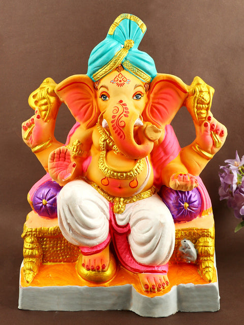 Graceful 13.3-inch Manomay eco-friendly Ganesha idol seated in regal Raja pose with vibrant detailing and a majestic crown, perfect for eco-conscious Ganesh Chaturthi celebrations. India’s Largest Pooja Accessories Brand – www.satvikstore.in