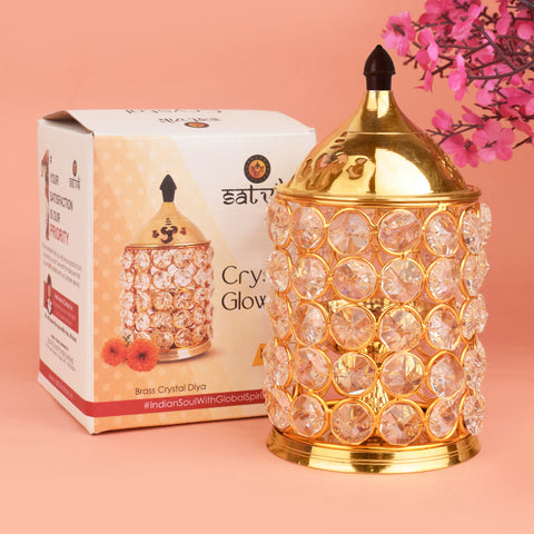 Pure Brass Crystal Glow Chimney Diya – A beautifully crafted diya made from pure brass, featuring a stunning crystal glow design. India’s Largest Pooja Accessories Brand – www.satvikstore.in