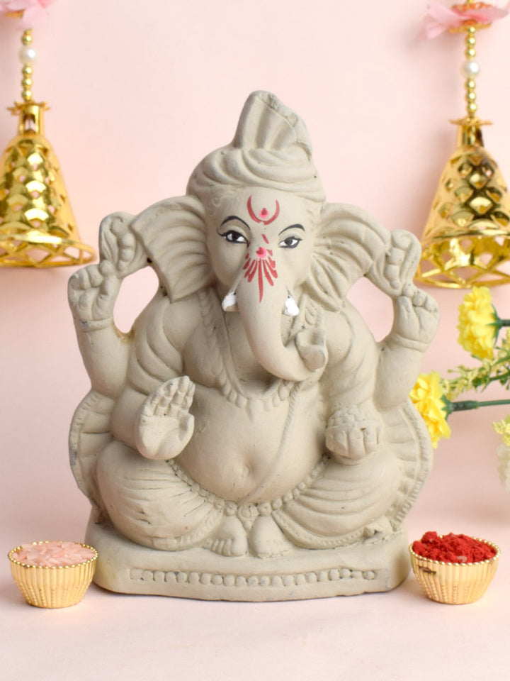 7 Inch eco-friendly Ganesha idol with folded legs made of natural shadu mati clay, ideal for home Ganesh Chaturthi celebrations. India’s Largest Pooja Accessories Brand – www.satvikstore.in