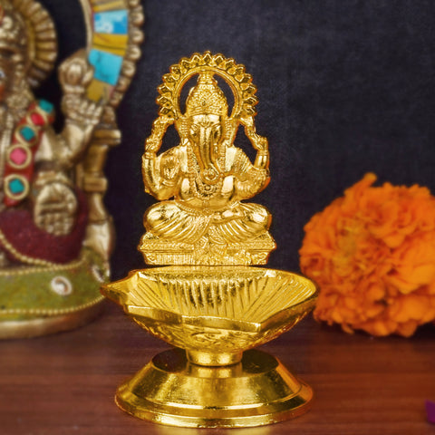1 Pc Lord Ganesha Metal Diya – A beautifully crafted metal diya featuring the divine image of Lord Ganesha, perfect for spiritual rituals and home decor. India’s Largest Pooja Accessories Brand – www.satvikstore.in