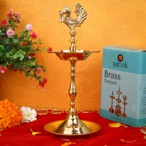 6.5 Inch Brass Peacock Kerala Diya – Handcrafted brass diya featuring a peacock motif, ideal for pooja rituals, temple lighting, and traditional décor. India’s Largest Pooja Accessories Brand – www.satvikstore.in