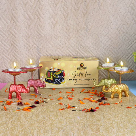 Set of 4 Spectacular Assorted Metal Elephant with Diya Showpieces, handcrafted with intricate detailing, ideal for pooja ceremonies, festive décor, or as a unique gift. India’s Largest Pooja Accessories Brand – www.satvikstore.in